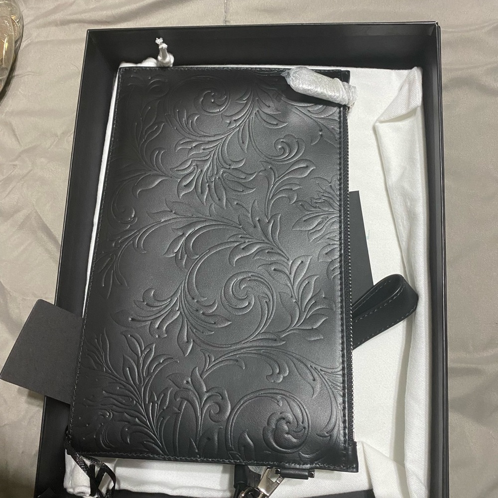 Versace Black Embossed clutch bag -unused condition beautiful condition
